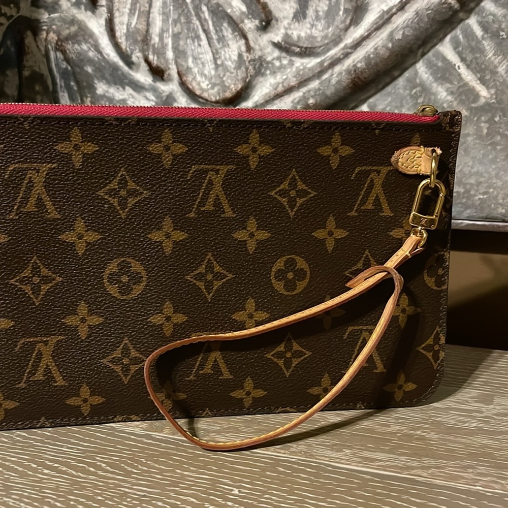 LV Signature wristlet